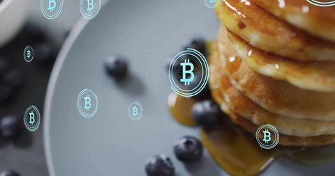 Pancakes and Blueberries with Bitcoin Icons Highlighting Innovation