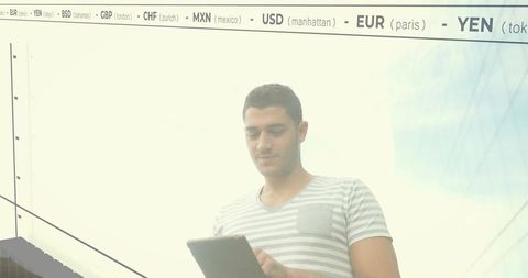 Modern professional with tablet in urban finance environment