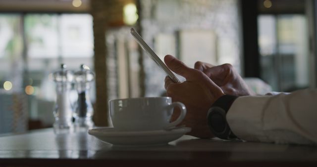 Person Using Smartphone at Café Table - Download Free Stock Images Pikwizard.com