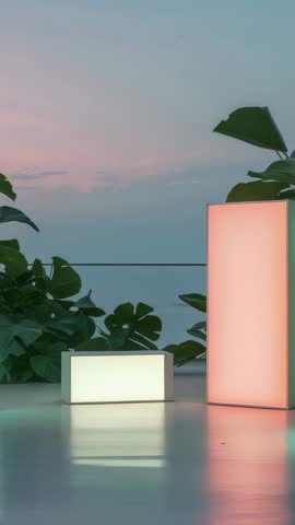 LED Columns Shifting Orange to Turquoise on Dusk Terrace Creating Ambient Glow