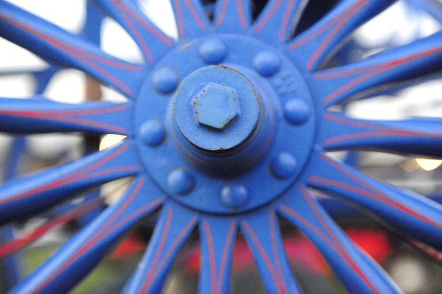 Close-up of Blue Train Wheel Spokes in Motion - Download Free Stock Images Pikwizard.com