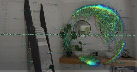 Glitching modern bathroom with floating wood vanity, double sinks and round mirrors