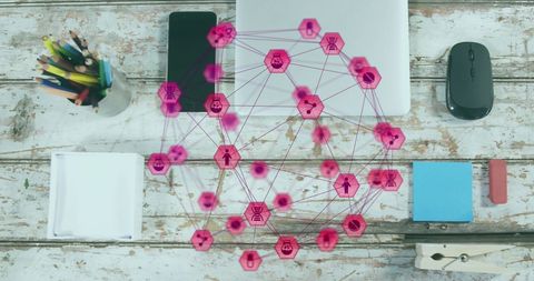 Technology and networking concept on wooden desk surface