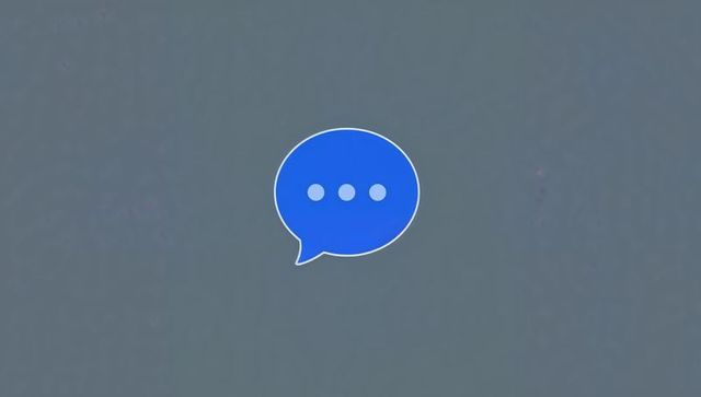 Minimal blue chat bubble icon with typing dots on soft gray canvas for ui, messaging, branding