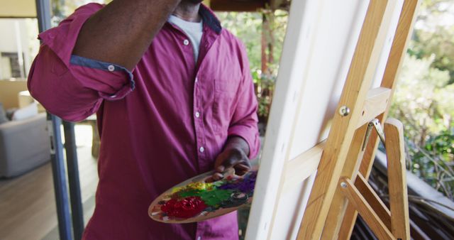 Adult Artist Painting Indoors in Natural Light - Download Free Stock Images Pikwizard.com