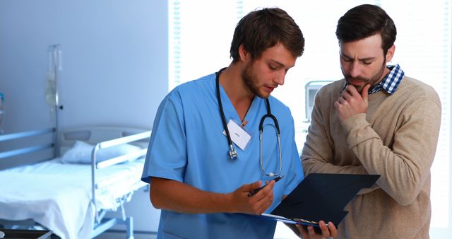 Healthcare Professional Consulting Patient in Hospital Room - Download Free Stock Images Pikwizard.com