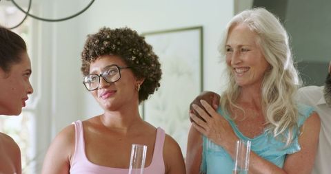 Guests Socializing and Celebrating at Joyful Wedding Reception