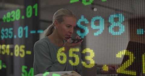 Financial analyst communicating strategically in modern workspace