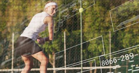 Female Tennis Player Hitting Tennis Ball with Digital Overlays