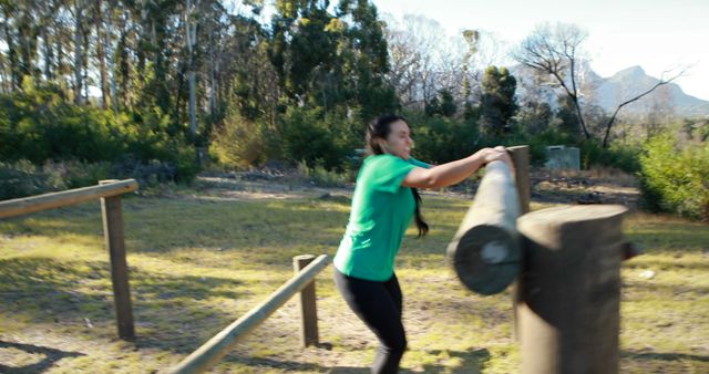 Woman Navigating Outdoor Obstacle Course in Nature - Download Free Stock Images Pikwizard.com