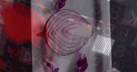 Halved purple onion resting on glossy panel with futuristic red hud overlay