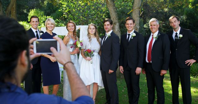 Family and Friends Posing for Outdoor Wedding Photo - Download Free Stock Images Pikwizard.com