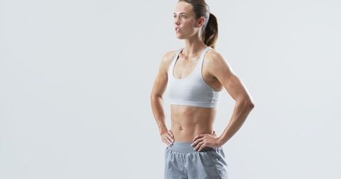 Focused Woman in Activewear Emphasizing Fitness Determination - Download Free Stock Images Pikwizard.com