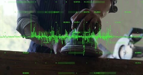 Woodworker Using Orbital Sander with Digital Interface Overlay