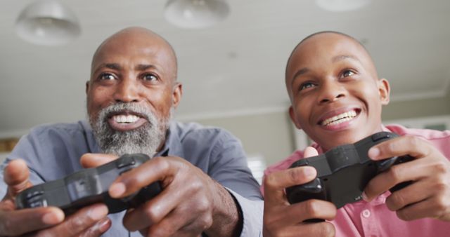 Joyful African American Men Playing Video Games Together - Download Free Stock Images Pikwizard.com