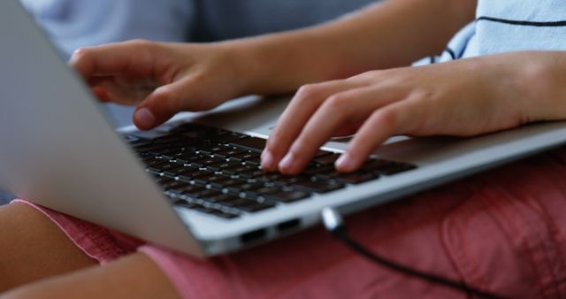 Hands Typing on Laptop Keyboard in Lap - Download Free Stock Images Pikwizard.com