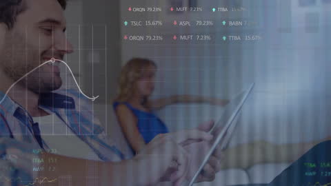 Young Man Engaging with Stock Market Data on Tablet