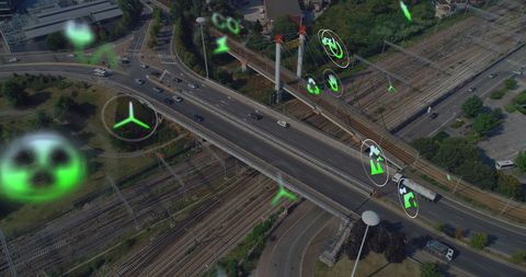 Eco Icons Overlay on Urban Roads Representing Data Processing