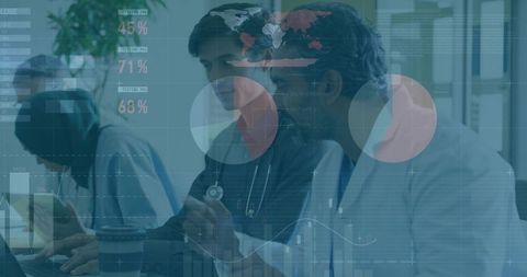 Medical team analyzing data on transparent technology display