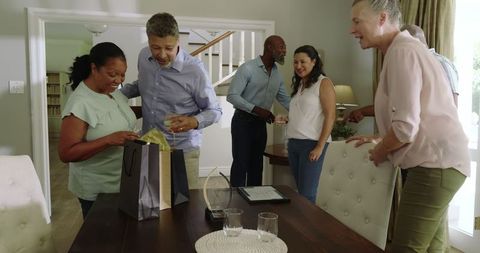 Diverse Group of Friends Celebrating Together at Home
