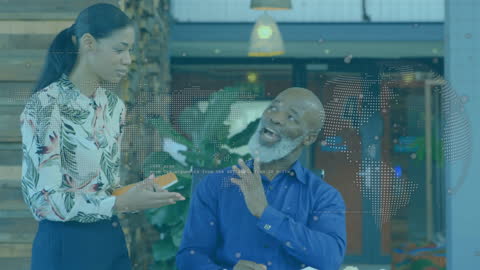 Diverse Colleagues Collaborating in Technologically Advanced Office