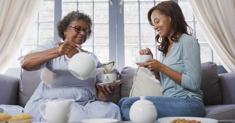 Senior Mother and Daughter Bonding Over Relaxing Tea Time - Download Free Stock Images Pikwizard.com