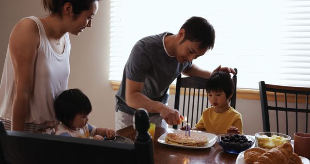 Happy Family Enjoying Pancake Breakfast Together - Download Free Stock Images Pikwizard.com