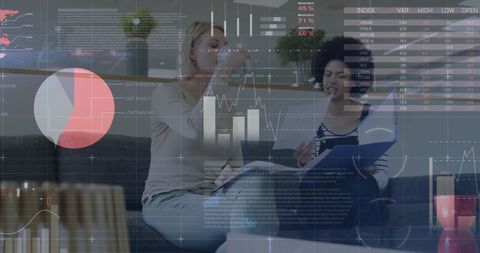 Diverse Female Team Analyzing Data with Digital Interface