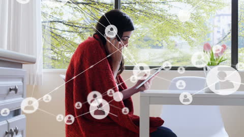 Businesswoman Engaging with Digital Network on Tablet