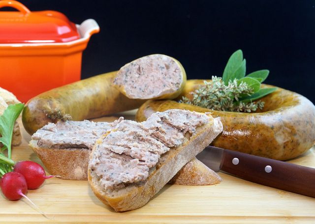 Freshly Sliced Meat Sausage Spread on Bread with Herbs - Download Free Stock Images Pikwizard.com