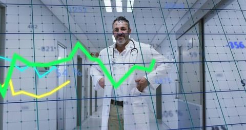 Doctor Standing in Corridor Analyzing Healthcare Data with Digital Graph Overlay