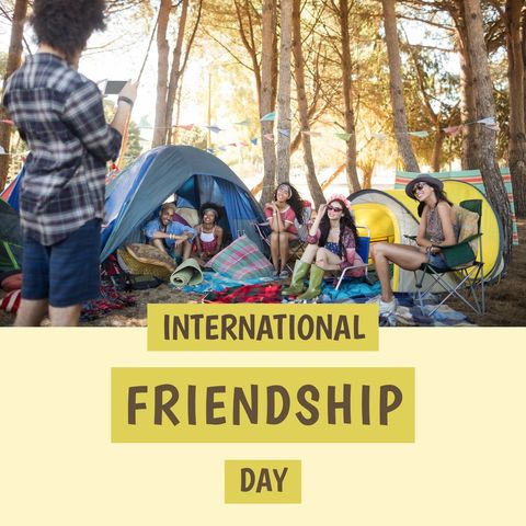 Diverse group celebrating international friendship day at camp