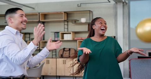 Happy office celebration team ribbon cutting