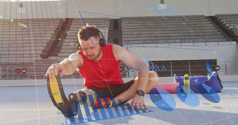 Athlete with Prosthetic Blade Training in Stadium