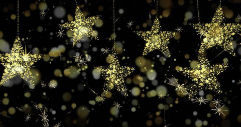 Glittering Gold Stars with Snowflakes on Black Background