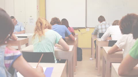 Students Taking Exam in Classroom Setting