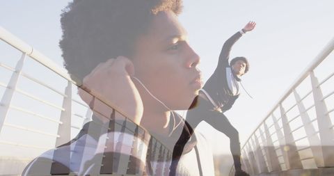 Active Black Man Stretching Outdoors with Headphones