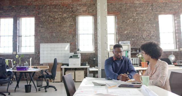 Coworkers Collaborating in Modern Industrial Office - Download Free Stock Images Pikwizard.com