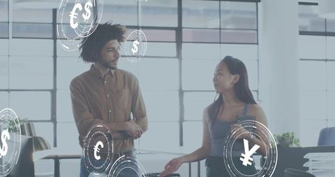 Coworkers Discussing Global Finance with Currency HUD in Modern Open-Plan Office