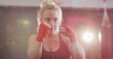 Female boxer training with red wraps, throwing focused punches in backlit gym overlay