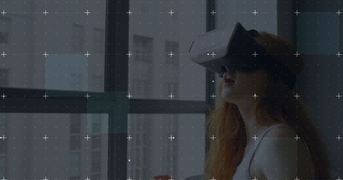 Woman Experiencing Virtual Reality at Home with Advanced Headset - Download Free Stock Images Pikwizard.com