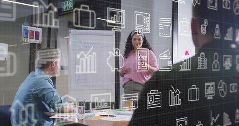 Diverse Team Analyzing Reports in Office with Virtual Icons Overlay