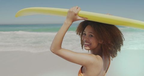 Joyful Surfer Enjoying Sunny Beach Day