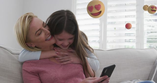 Mother and Daughter Enjoying Time Together Using Smartphone - Download Free Stock Images Pikwizard.com