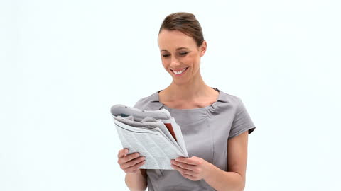Smiling Woman Reading Magazine on Bright White Background