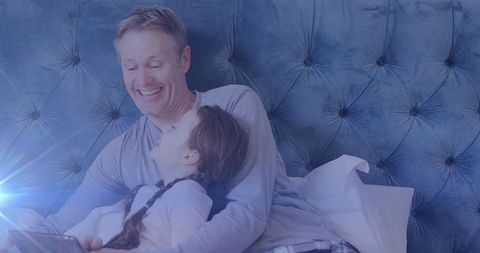 Father and Daughter Sharing Happy Moment at Home