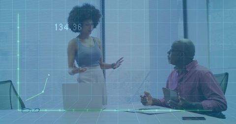 Professionals Analyzing Finance Data in Modern Office