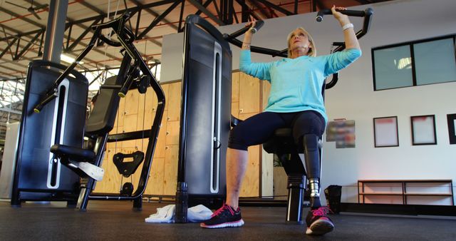 Senior Woman Doing Weight Training Exercises at Gym - Download Free Stock Images Pikwizard.com