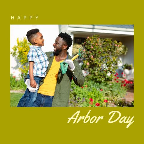 African American Father and Son Gardening on Arbor Day
