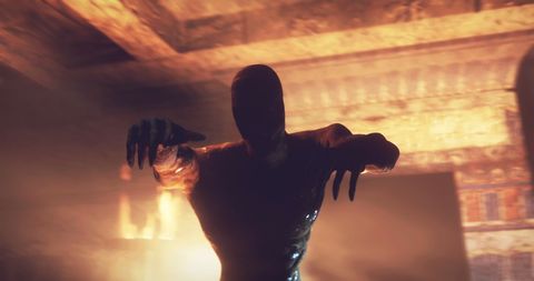 Zombie Mummy Stalking in Crypt with Flickering Torch Light